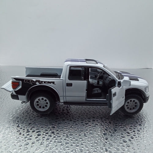 Ford raptor superCrew blanca c/rayas -Chico