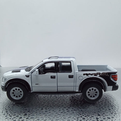 Ford raptor superCrew blanca c/rayas -Chico