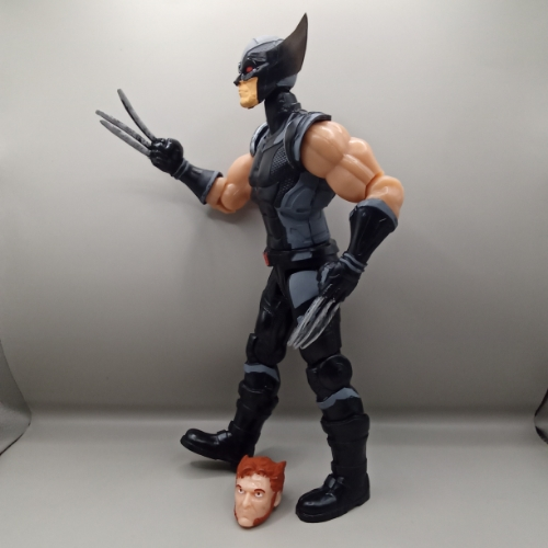 Wolverine traje negro 2 caras/ Marvel Héroes